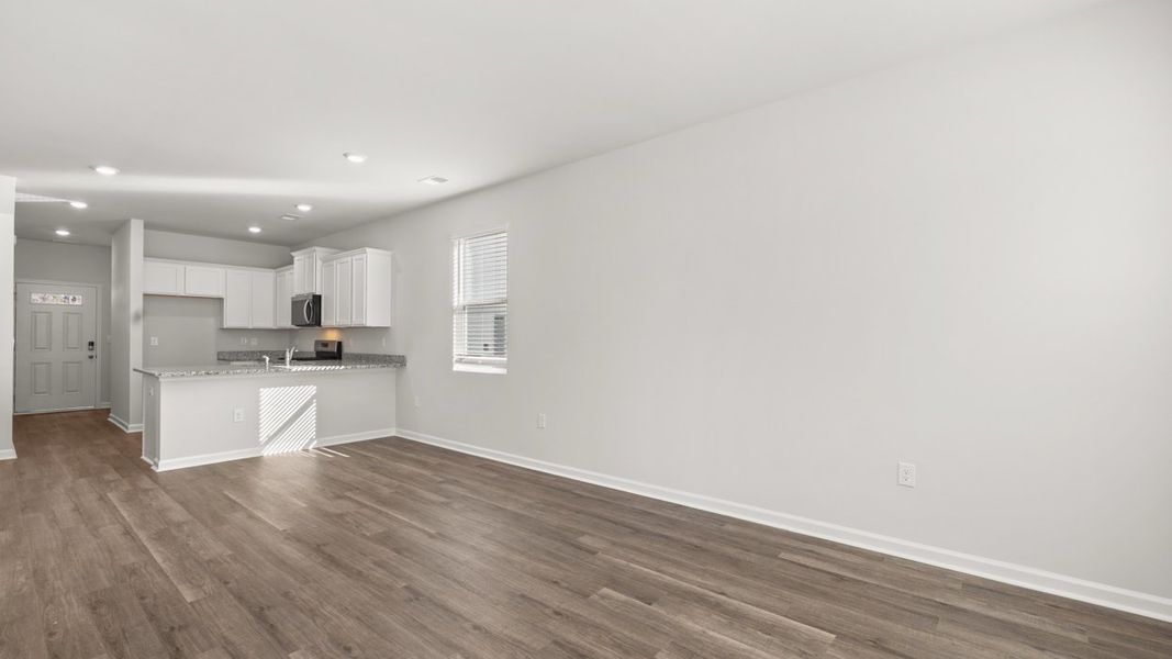 Spacious, unfurnished interior of a new home in Byrd Village, Graniteville (Image 12).