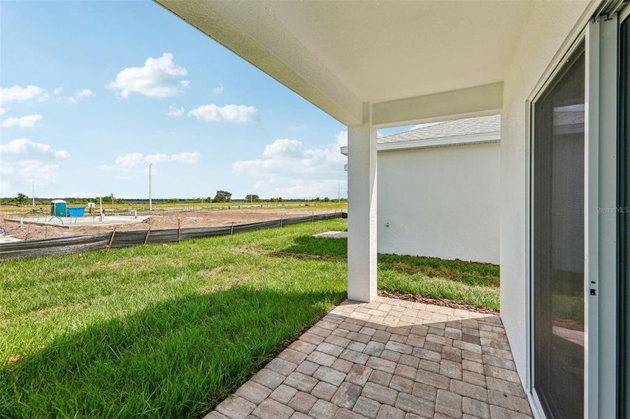 Exterior details and patio area of a home in Willowbrook North, Winter Haven (Image 21).
