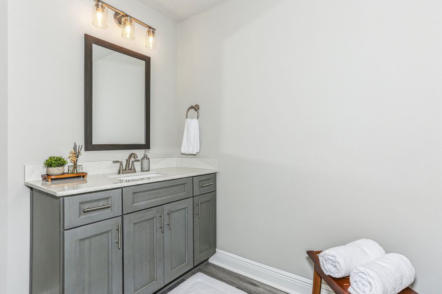 Representative furnished interior of a home built from the The Sapphire by Herbst Homes in Prosperity Point, Milton (Image 87).