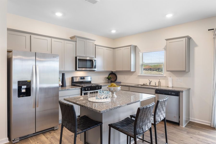 Representative furnished interior of a home built from the Mansfield by D.R. Horton in Sweet Briar, Ooltewah (Image 9).