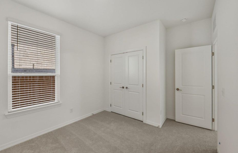 Spacious, unfurnished interior of a new home in Crosswinds, Kyle (Image 18).