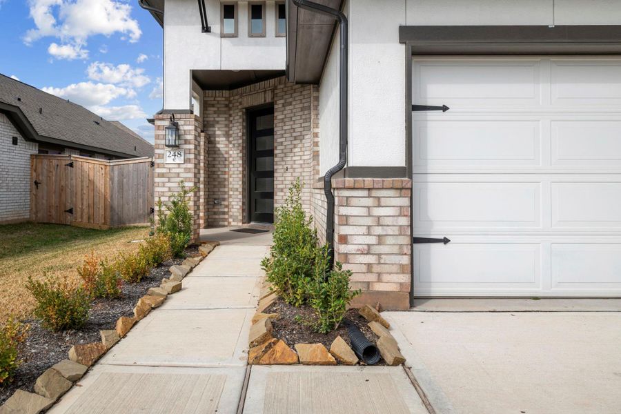 Exterior details and patio area of a home in , Conroe (Image 20).