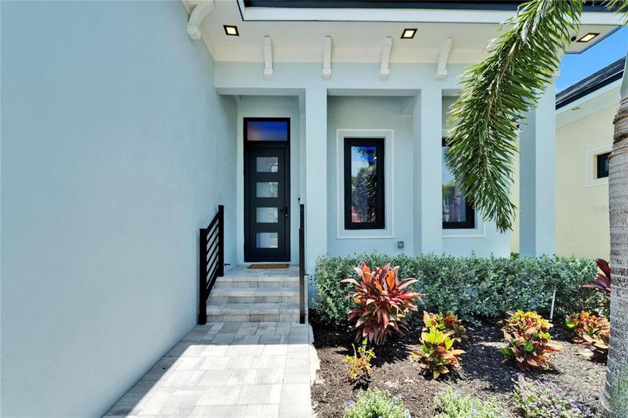Front exterior of a new home in , Apollo Beach, FL, highlighting curb appeal (Image 18).