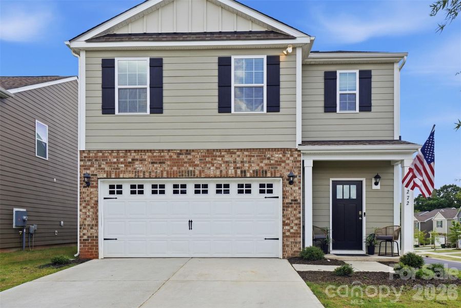Front exterior of a new home in Fergus Crossing, York, SC, highlighting curb appeal (Image 2). Front exterior of a new home in Fergus Crossing, York, SC, highlighting curb appeal (Image 2).