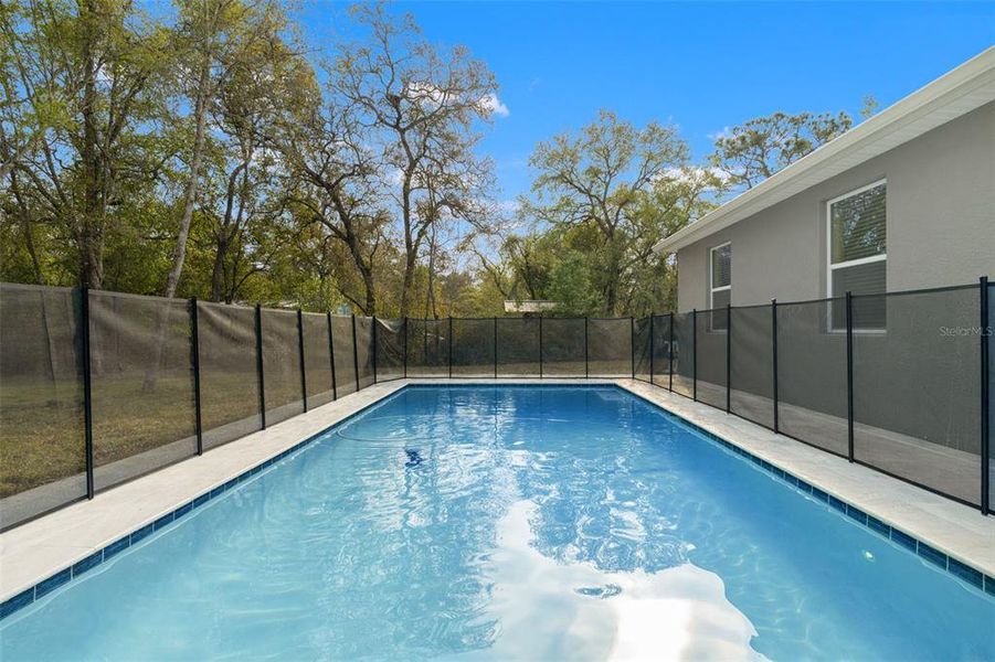 Exterior details and patio area of a home in , Spring Hill (Image 4).