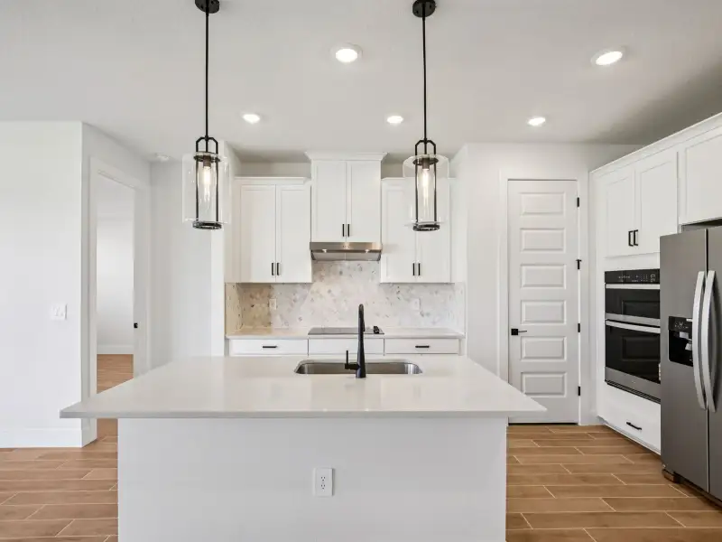 Furnished interior view inside a new home in Magnolia Bay - Reserve Series, Nokomis (Image 3).