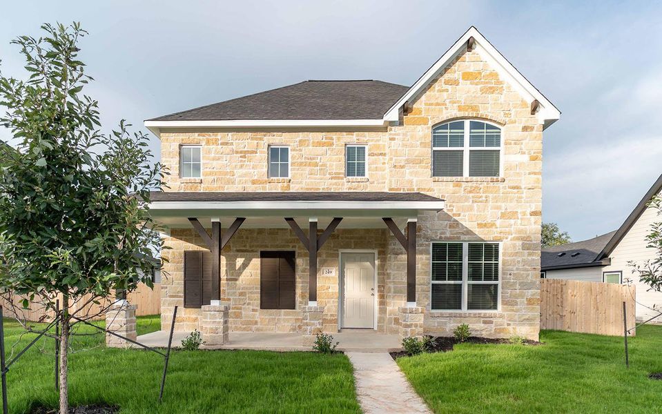 Front exterior of a new home in Sanctuary, Salado, TX, highlighting curb appeal (Image 1).