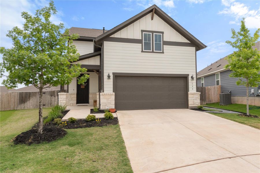 Front exterior of a new home in , Dripping Springs, TX, highlighting curb appeal (Image 2). Front exterior of a new home in , Dripping Springs, TX, highlighting curb appeal (Image 2).