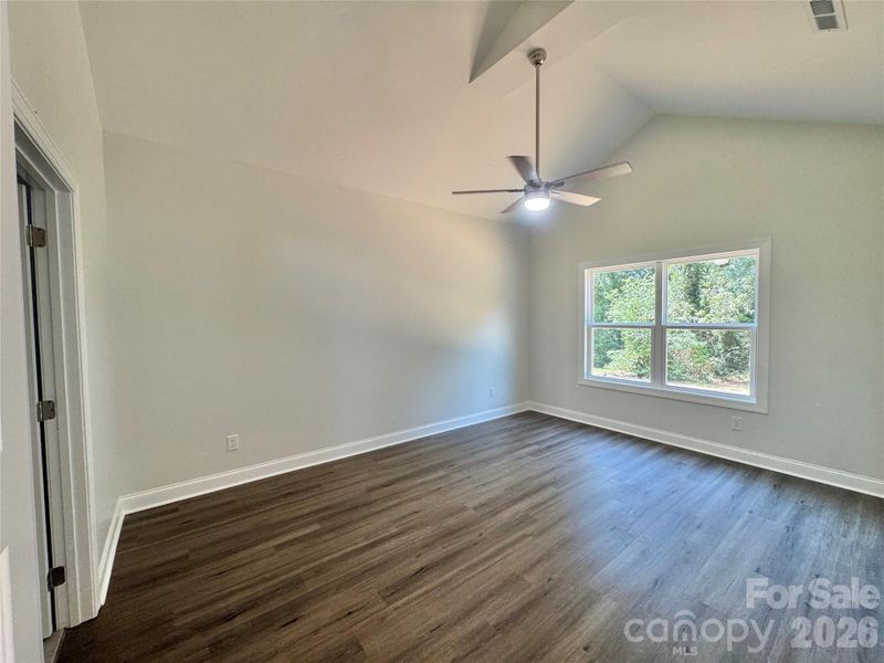 Vaulted Ceiling & LVP in Primary Bedroom