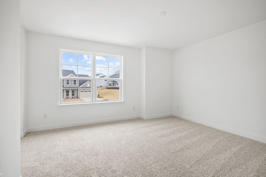 Spacious, unfurnished interior of a new home in Forest Creek, Waxhaw (Image 91).
