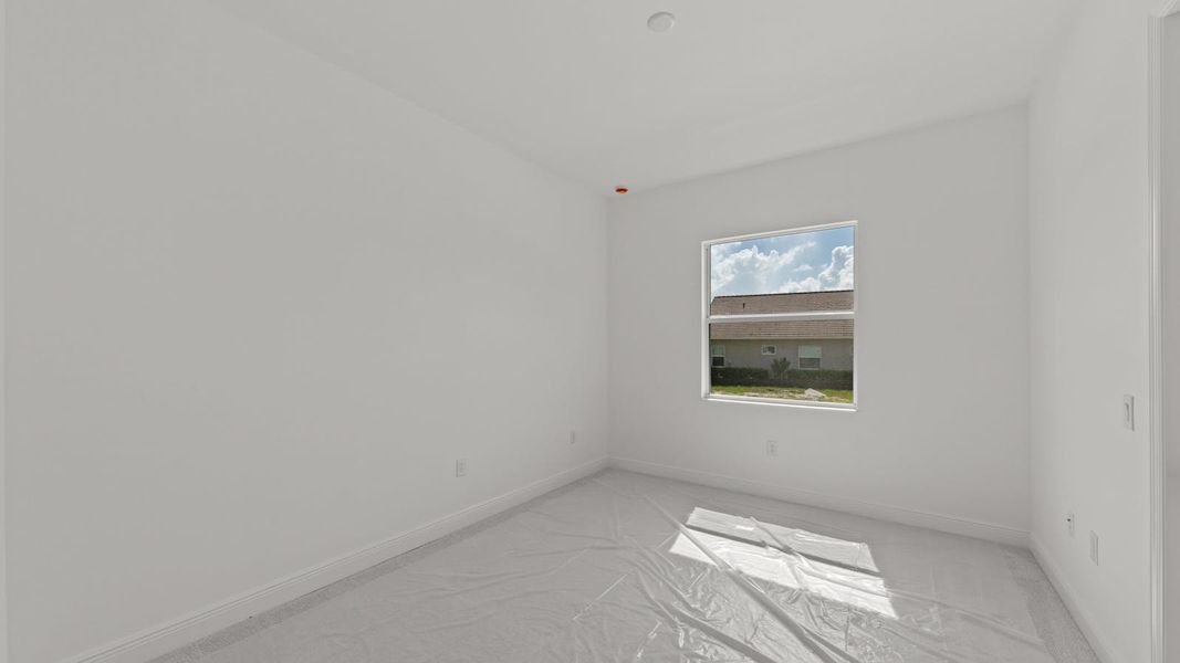 Spacious, unfurnished interior of a new home in Verandah Real Estate and Homes for Sale in Fort Myers, FL - Neal Communities, Fort Myers (Image 27).