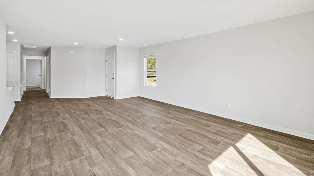Representative unfurnished interior of a home built from the BAYSHORE by D.R. Horton in Indigo Preserve Townhomes, Leland (Image 20).