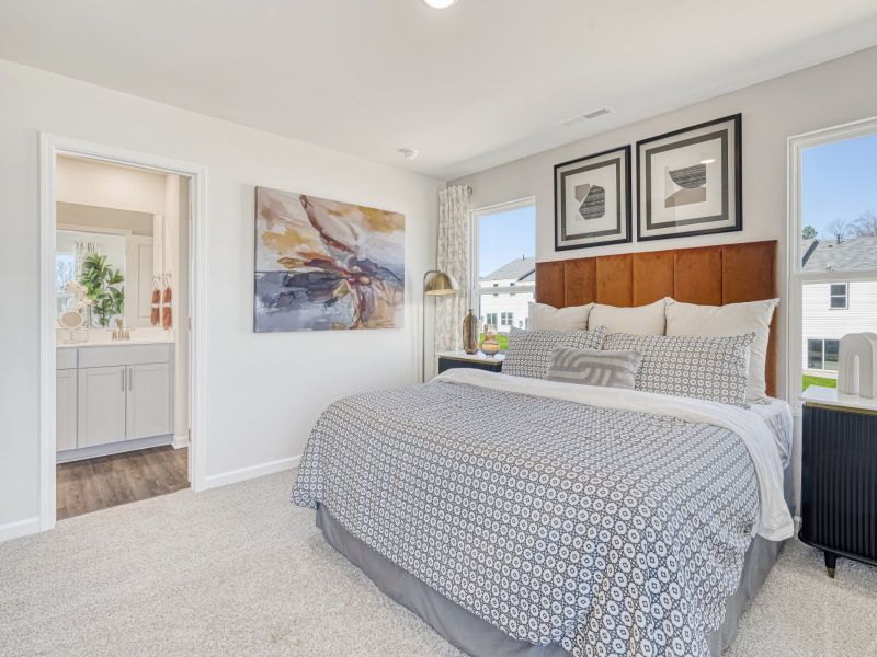 Primary bedroom in the Amber floorplan at a Meritage Homes community in Graham, NC.