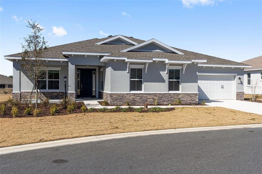 Front exterior of a new home in , Ocala, FL, highlighting curb appeal (Image 19).