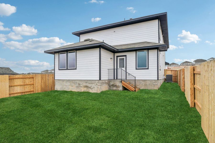 Exterior details and patio area of a home in Cloverleaf, Austin (Image 21).