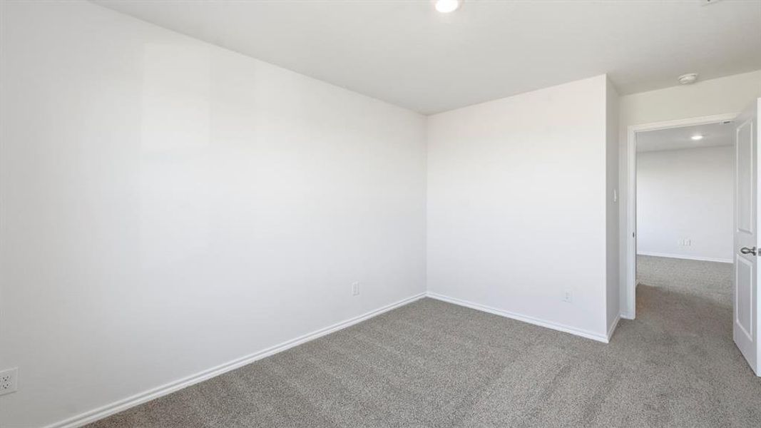 Spare room with carpet and recessed lighting Spare room with carpet and recessed lighting