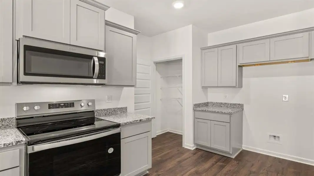 Furnished interior view inside a new home in Champion's Run, Lithonia (Image 13).