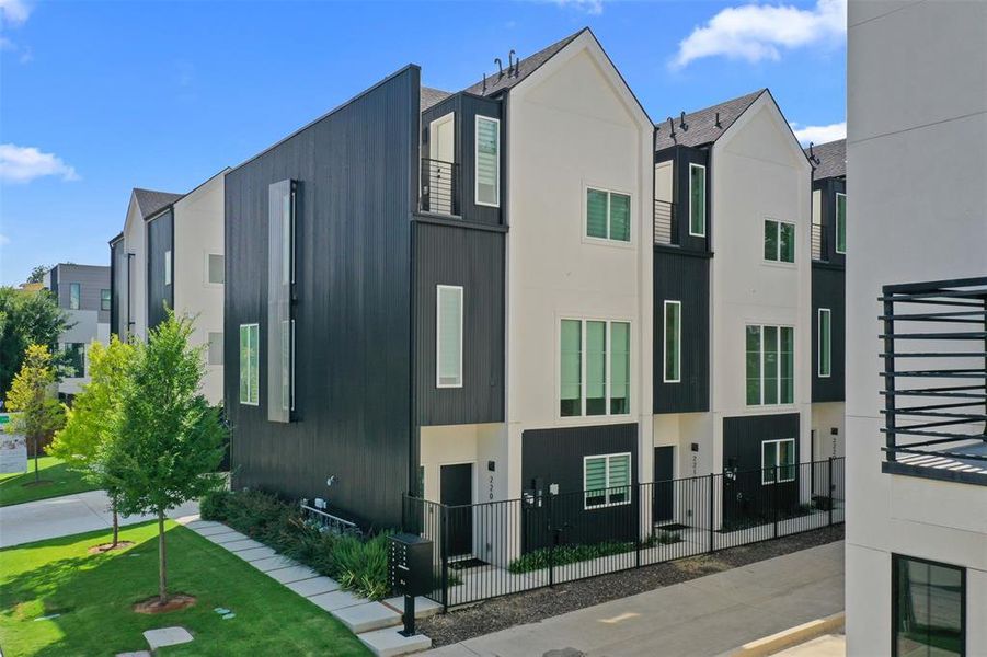 Front exterior of a new home in , Dallas, TX, highlighting curb appeal (Image 20).