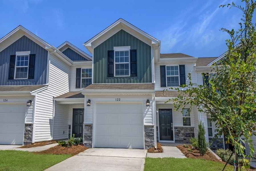 Front exterior of a new home in Point at Chestnut Hills Place, Columbia, SC, highlighting curb appeal (Image 1).