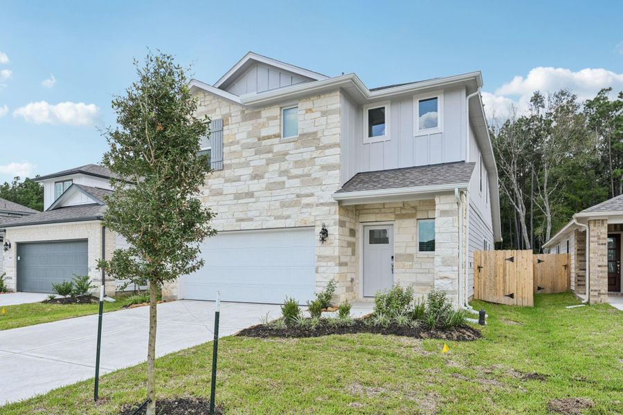 Front exterior of a new home in Landing Meadows - Traditional Series, New Caney, TX, highlighting curb appeal (Image 25).