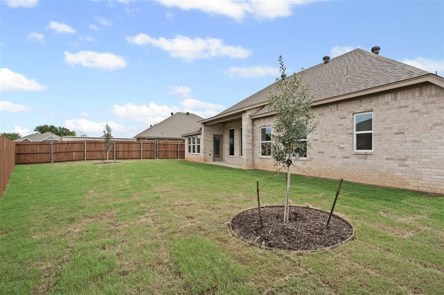 Front exterior of a new home in , Springtown, TX, highlighting curb appeal (Image 19). Front exterior of a new home in , Springtown, TX, highlighting curb appeal (Image 19).