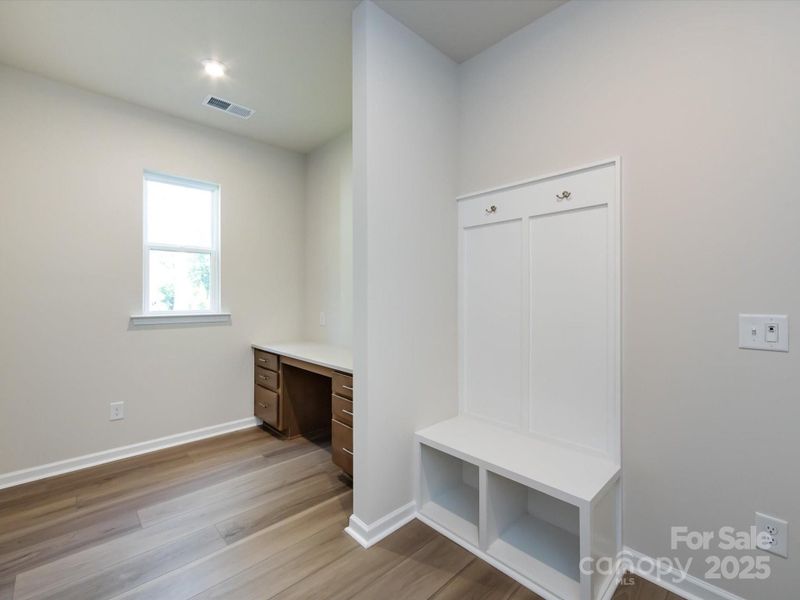 Built-in drop zone to make busy mornings and evenings a bit easier.