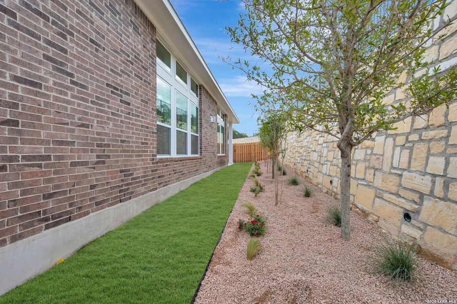 Exterior details and patio area of a home in Windsong - Legacy Series, Boerne (Image 4).