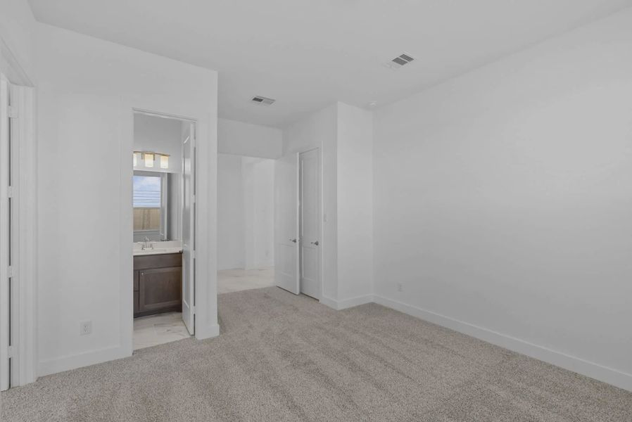 Representative unfurnished interior of a home built from the Nicklaus by Chesmar Homes in Riceland Alley Loads, Mont Belvieu (Image 69).