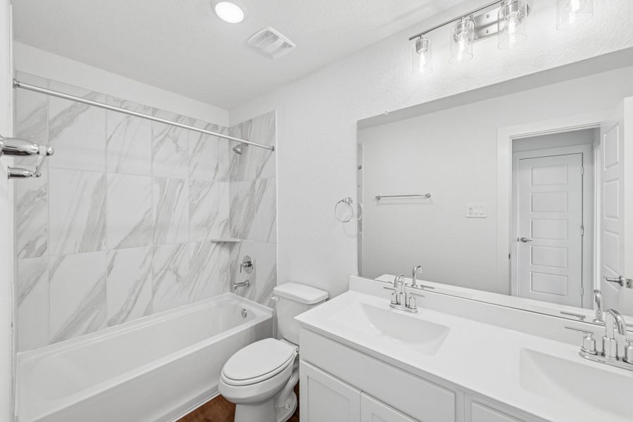 Furnished interior view inside a new home in Sorella, Tomball (Image 5).