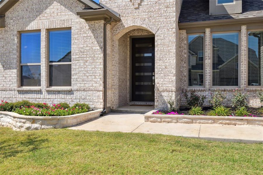 Front exterior of a new home in , Oak Point, TX, highlighting curb appeal (Image 20).