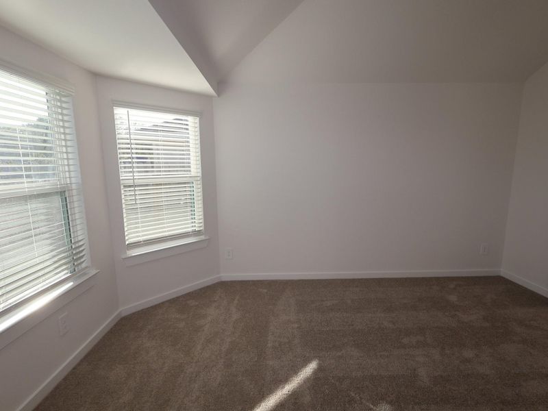 Spacious, unfurnished interior of a new home in Pinewood at Grand Texas, New Caney (Image 15).