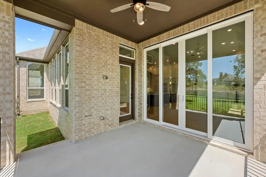View of patio featuring a ceiling fan View of patio featuring a ceiling fan