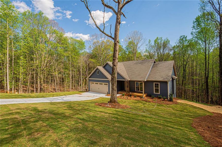 Front exterior of a new home in , Murrayville, GA, highlighting curb appeal (Image 28).