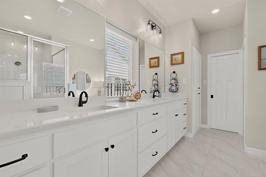 Primary ensuite with dual sinks and so much counter space