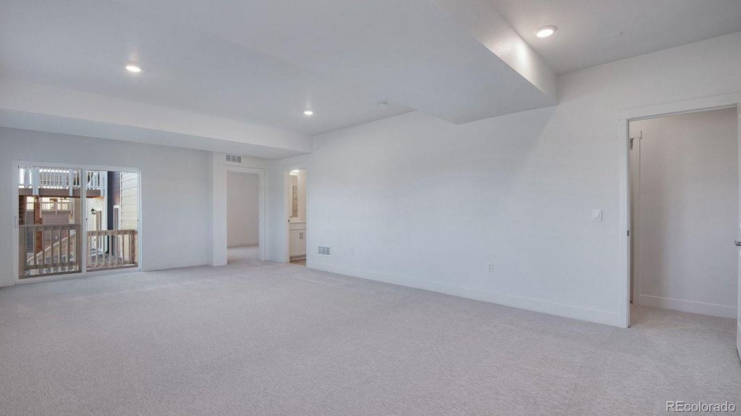 Spacious, unfurnished interior of a new home in Trails at Crowfoot, Parker (Image 24).