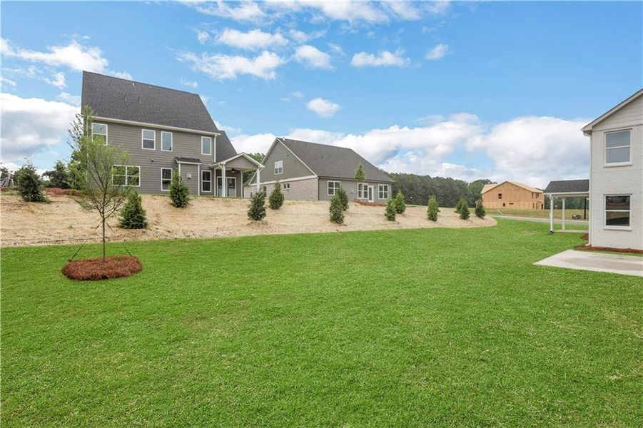 Exterior details and patio area of a home in , Loganville (Image 26).