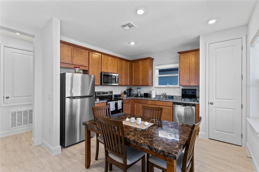 Furnished interior view inside a new home in Laureate Park, Orlando (Image 39).