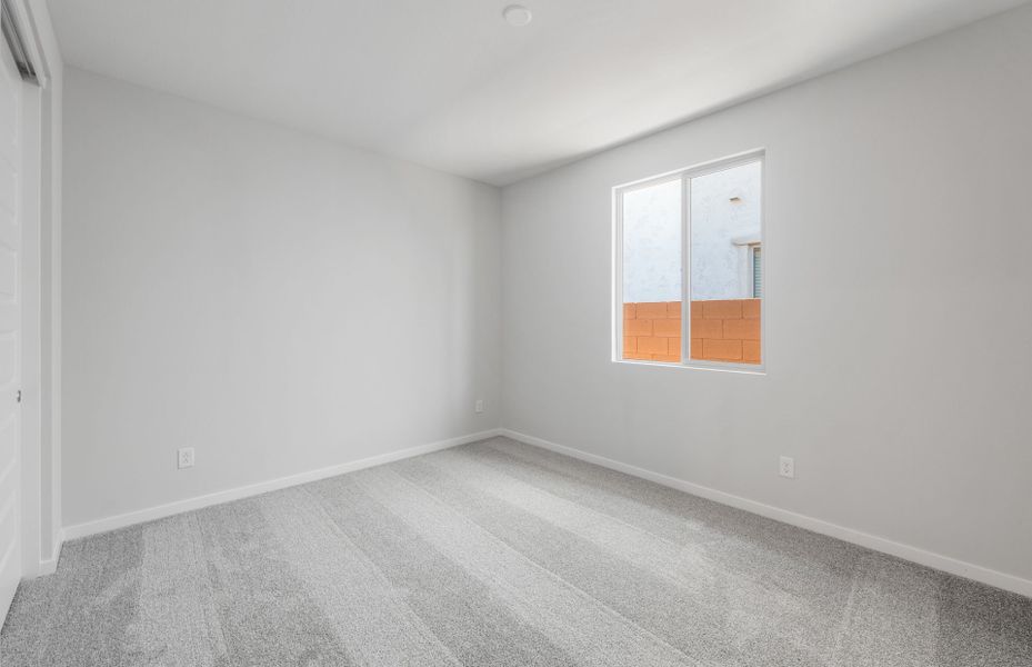 Spacious, unfurnished interior of a new home in Blossom Rock, Apache Junction (Image 19).