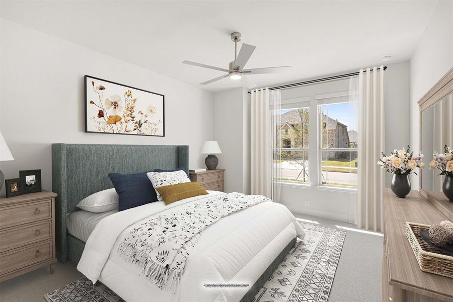 Bedroom with gray upholstered bed, ceiling fan, large window, and wood nightstands on carpeted floor