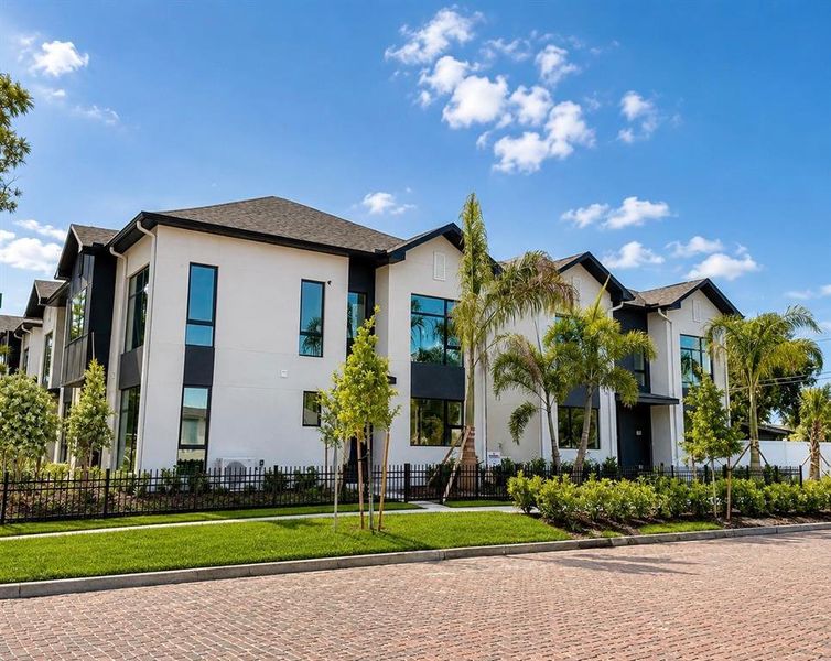 Front exterior of a new home in , St. Petersburg, FL, highlighting curb appeal (Image 1). Front exterior of a new home in , St. Petersburg, FL, highlighting curb appeal (Image 1).