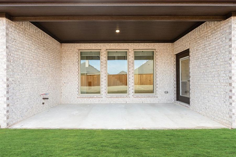 Exterior details and patio area of a home in Terracina, Rockwall (Image 4). Exterior details and patio area of a home in Terracina, Rockwall (Image 4).