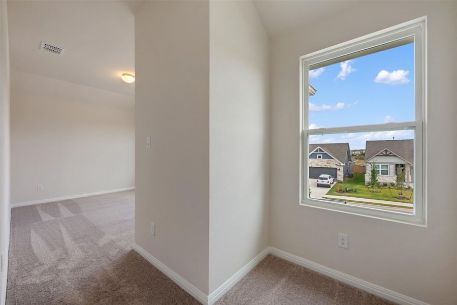 Spacious, unfurnished interior of a new home in Cannon Ranch, Dripping Springs (Image 24).