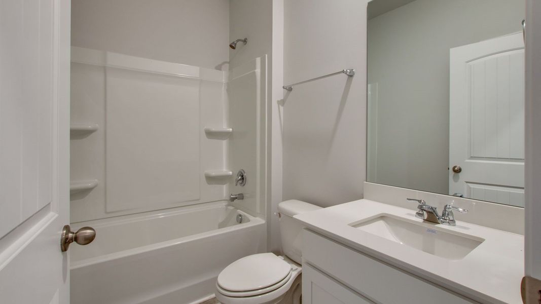 Furnished interior view inside a new home in The Parks, White House (Image 29).