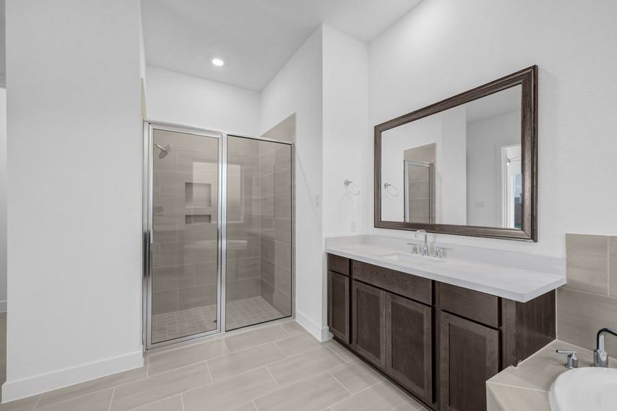 Furnished interior view inside a new home in Avalon at Friendswood 70s, Friendswood (Image 17).