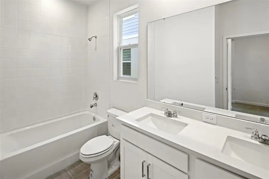 Furnished interior view inside a new home in Rainwood, Groveland (Image 7).