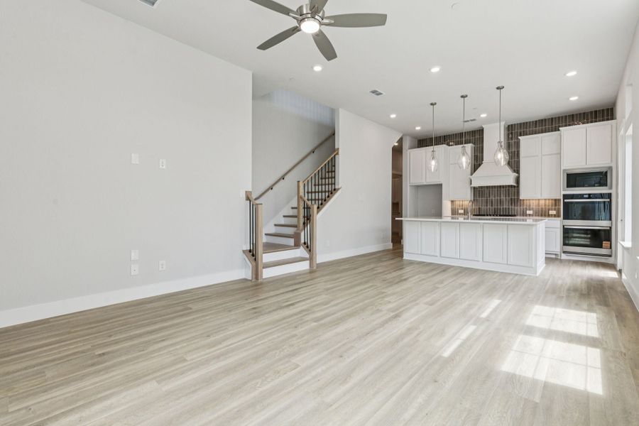 Representative unfurnished interior of a home built from the Hamilton by Centre Living Homes in Newman Village Townhomes, Frisco (Image 25).