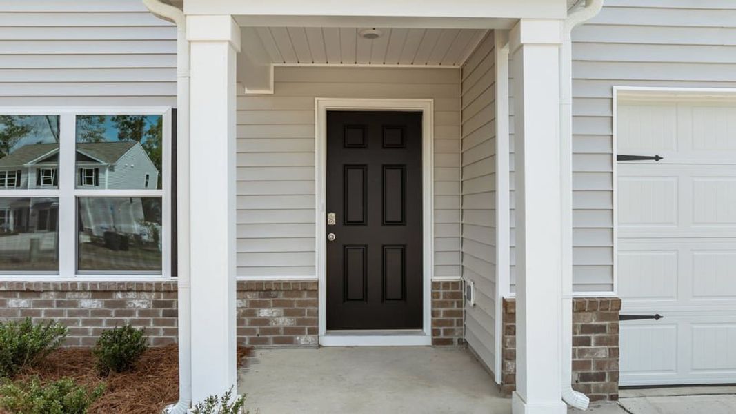 Exterior details and patio area of a home in Bynum Farms, Farmville (Image 3).