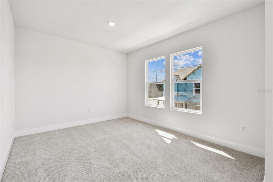 Spacious, unfurnished interior of a new home in Emerald Landing at Waterside at Lakewood Ranch – Cottage Series, Sarasota (Image 28).