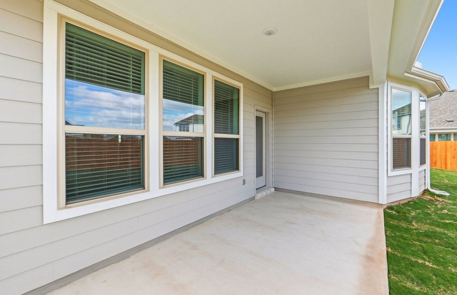 Exterior details and patio area of a home in Santa Rita Ranch, Liberty Hill (Image 26).