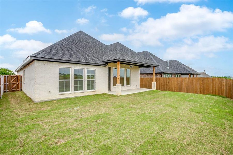 Exterior details and patio area of a home in , Benbrook (Image 23).